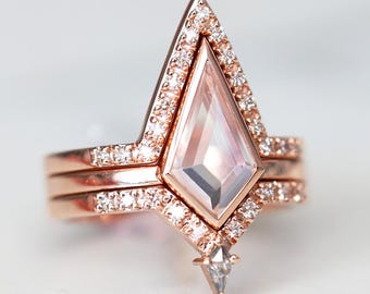Kite morganite set with diamonds