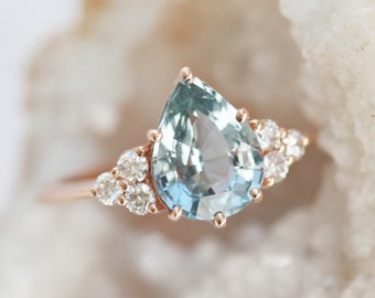 2.5ct aqua pear sapphire engagement ring with diamonds