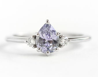 Pear lavender sapphire ring three stone diamond ring with pear sapphire