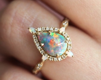 Pear Black opal ring, Unique opal engagement ring with halo diamonds and opals