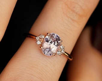 Oval pink lavender sapphire engagement ring with side diamonds, sapphire cluster ring