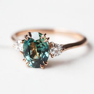 Bicolor sapphire & diamond engagement ring, Three stone ring, Oval blue green sapphire ring