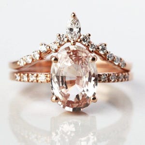 Oval peach sapphire ring set, Diamond sapphire engagement ring with cluster diamond band