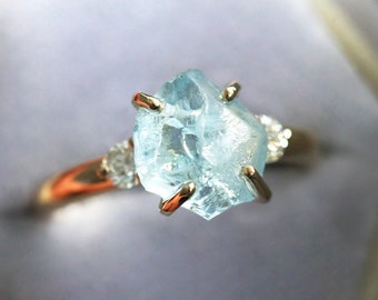 Raw gemstone engagement ring with side diamonds, Three stone diamond engagement ring