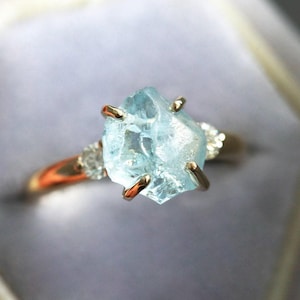 Raw gemstone engagement ring with side diamonds, Three stone diamond engagement ring