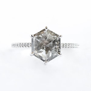 Hexagon salt and pepper diamond ring with pave diamond band claw prong set