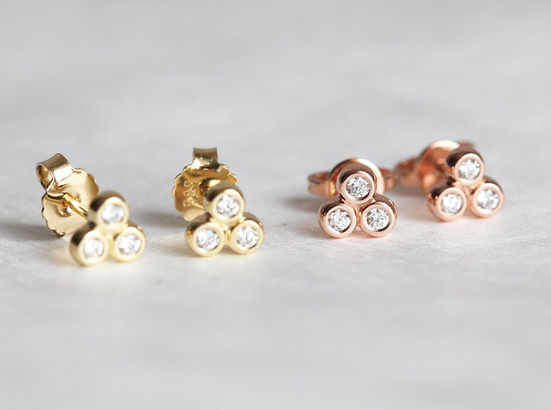 trio diamond stud earrings