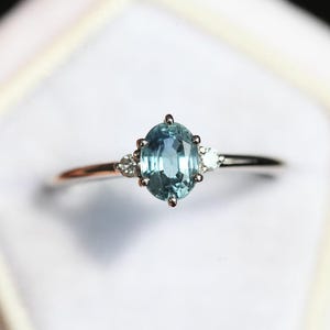 Montana sapphire ring, Three stone ring, Oval sapphire engagement ring, Aqua blue sapphire engagement ring
