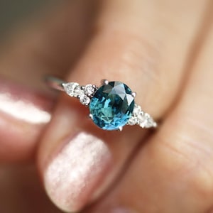 Oval teal sapphire cluster ring, unique Sapphire engagement ring, blue green sapphire, oval engagement ring with side diamonds