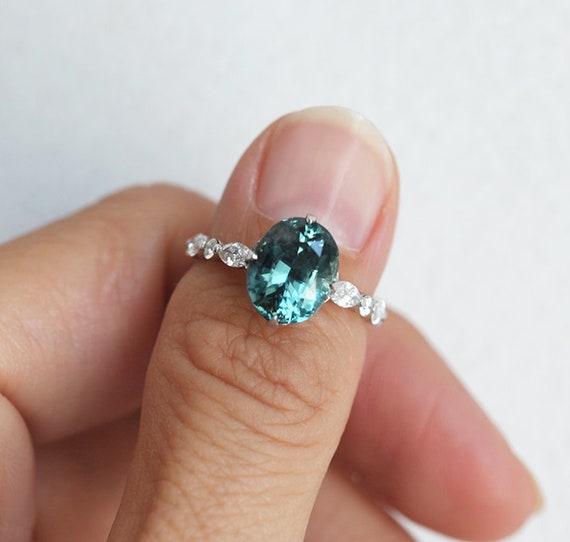 Oval teal shop sapphire ring