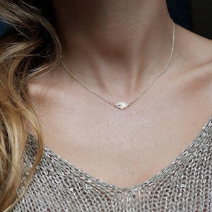Hamsa necklace, Gold diamond hand, Tiny ruby protection charm, Sideways pendant