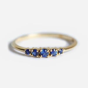 Blue Sapphire Ring with five stones 14k yellow Gold