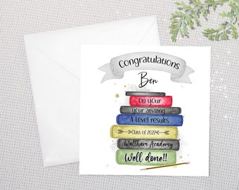 May include: A white card with a watercolor illustration of a stack of books. The card says "Congratulations Ben on your amazing A-Level results Class of 2022 Wallham Academy Well done!!"