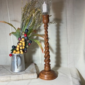 Really pretty solid walnut wood, tall, 15 inch Barley Twist candlestick holder. Use with included votive cup or taper candles. Free Shipping