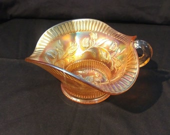 Dugan Glass Wind Flower patterned Marigold Carnival glass dish. Ruffled edge, with handle and spout . 7 inches across. Free Shipping!