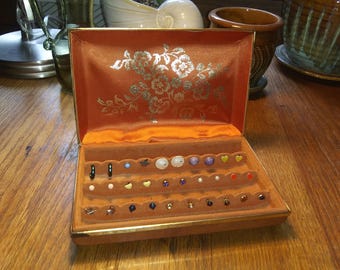 15 pairs small stud earrings in a Vintage orange snap shut clamshell jewelry box organizer. Free Shipping!