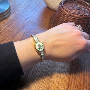 Pretty, delicate vintage ladies watch, Swiss made by Daltos. Enamel floral on Gold tone. Bracelet style, spring closure. Free Shipping! image 8