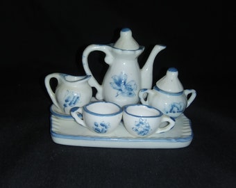 Vintage miniature child/doll tea set. White with blue floral pattern. Free shipping!