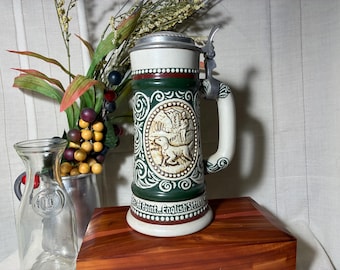 Vintage Ceramic beer stein with hinged pewter lid, raised hunting and fishing scenes. Made in Brazil for Avon. Free Shipping!