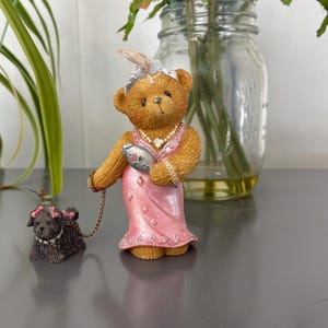 Cherished Teddies, Enesco, 2000 “Julia Bearon” 2 piece membership figurine. Bear in pink gown with chain leash and dog. Free Shipping!
