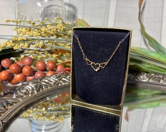 Vintage gold tone triple heart chain necklace with 2 crystal accents. Delicate, pretty, in original box, with Free Shipping!