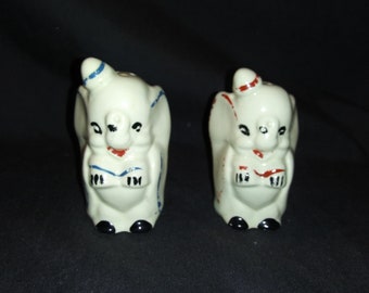 Pair of very old 1940's Disney Dumbo porcelain salt and pepper shakers. Free Shipping!