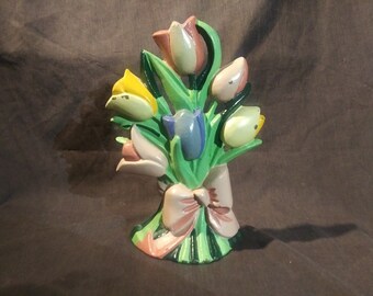 Vintage cast iron door stop in the shape of tulips. Painted green, pink, and yellow. Nice Farmhouse Decor. Includes Free Shipping!