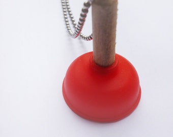 El émbolo - Collar encogido y divertido