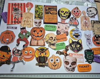 May include: A collection of vintage-style Halloween paper ephemera including die-cut stickers of skulls, jack-o'-lanterns, black cats, owls, bats, and Frankenstein's monster, alongside printed tickets and labels with text like Death Dust and Bone Powder.