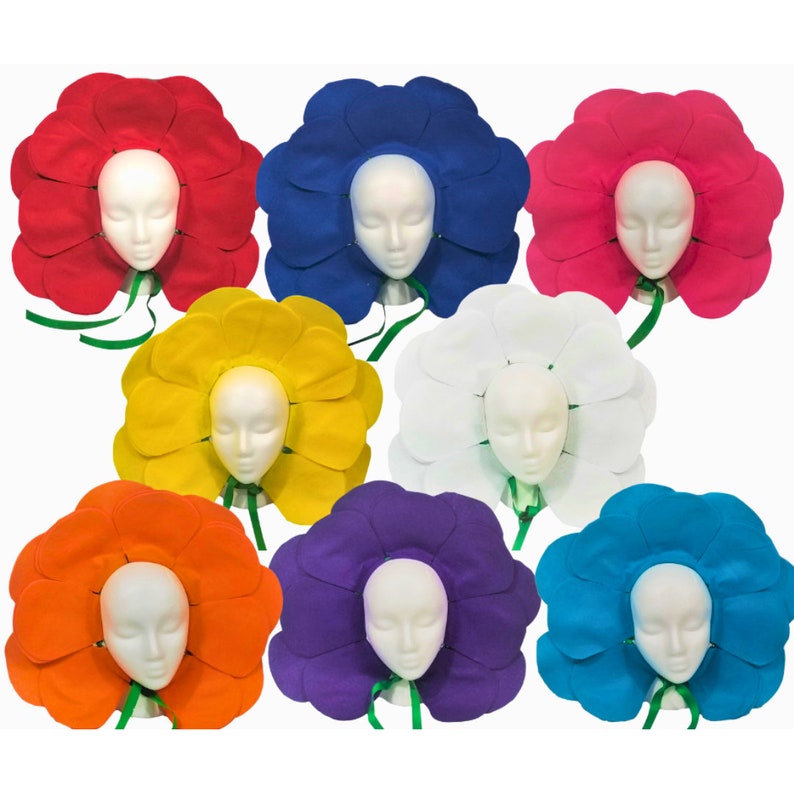 May include: Eight felt flower hats in different colors: red, blue, pink, yellow, white, orange, purple, and turquoise. Each hat has a large flower shape with multiple petals and a green ribbon.