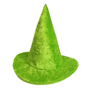 May include: A bright green velvet witch hat with a wide brim and a tall, pointed crown. The hat has a soft, textured appearance and is set against a white background. This festive hat is suitable for Halloween or costume parties.