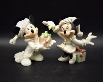 Lenox Christmas with Mickey and Minnie's Christmas Wish Porcelain Figurines. Minnie is holding Mistletoe and Mickey with a present. Great!
