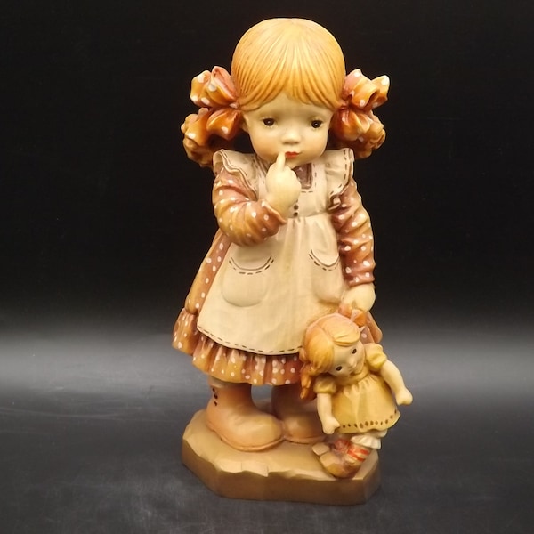 Vintage Anri "Bedtime" carved wood figurine. Designed by Sarah Kay. Young girl holding her doll trying to delay her bedtime. Limited Edition