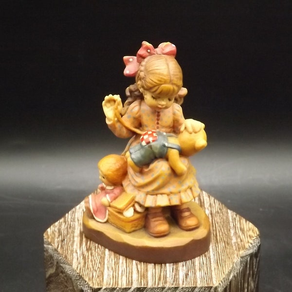 Vintage Anri "Good as new" carved wood figurine. Designed by Sarah Kay numbered 2057/4000. Young girl repairing her Teddy Bear.