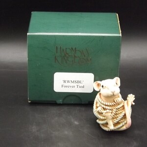 May include: A white mouse figurine tied up with rope, sitting on a green box with the text 'Harmony Kingdom' and 'Forever Tied' on it.