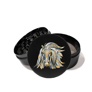 May include: Black grinder with a removable lid and a black and gold horse design on the lid.