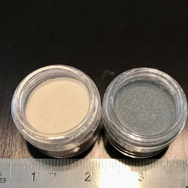 Ranger 1/2 ounce Jar of Embossing Powder.