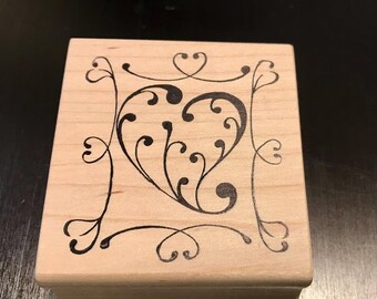 Magenta Flourished Heart Framed with Swirled Hearts Wood Mounted Rubber Stamp.