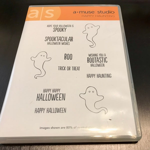 A Muse Studio Happy Haunting Cling Rubber Stamps.