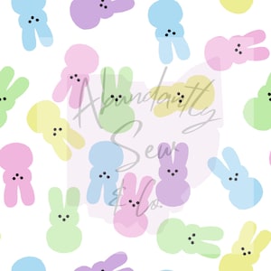 Peut inclure: Un motif sans couture composé de formes de lapins de couleur pastel avec des yeux noirs. Les lapins sont disposés de manière aléatoire sur un fond blanc.