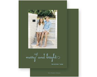 May include: A holiday card with a green background and a photo of two children sitting on steps. The words "merry and bright" are written in light blue script. The family name and year are also included.