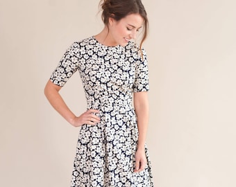 Navy floral dress with pleated skirt