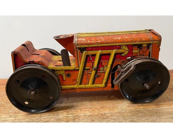 Vintage Marx Toy Co - Wind Up Tractor - Geperst staal - Oranje met rode wielen