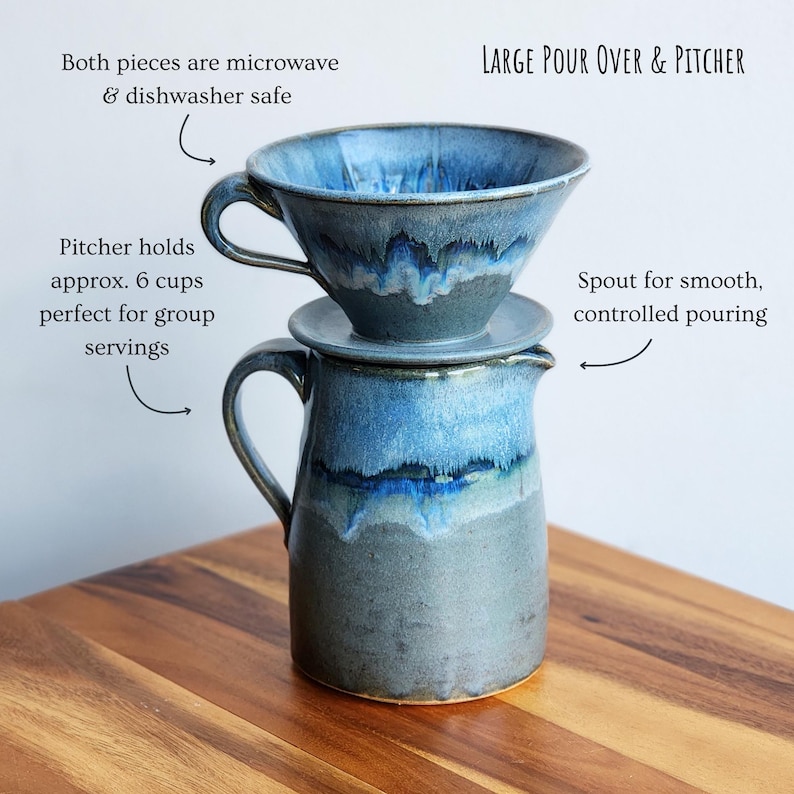 May include: A large, handmade pour-over coffee set with a matching pitcher. The set is glazed in shades of blue and gray. The pitcher holds approximately 6 cups. The pour-over has a spout for controlled pouring. Both pieces are microwave and dishwasher safe.