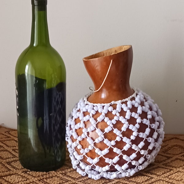 Şèkèrè (medium-small Yoruba-style netted gourd rattle)
