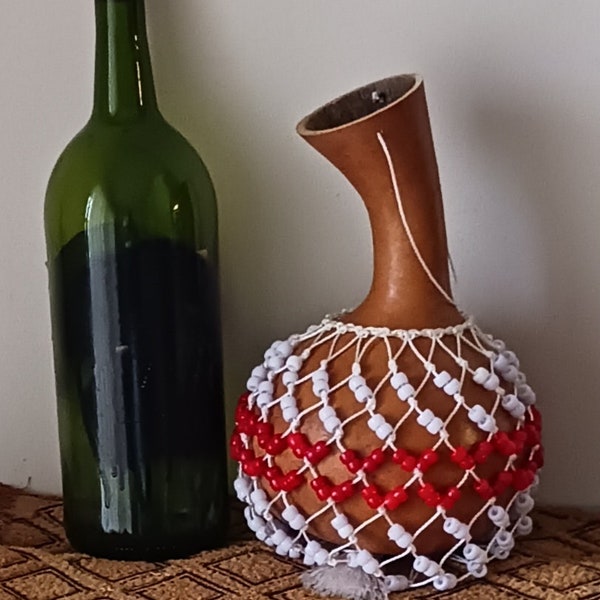 Igbo-style netted gourd rattle (ichaka/ishaka): medium