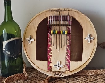 Igbo-style gourd-resonated "thumb piano" (ubo-aka)