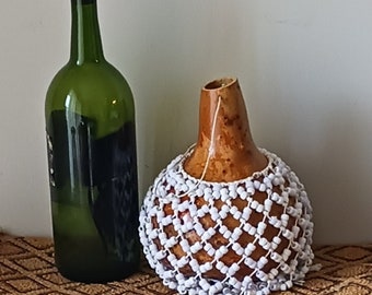 Şèkèrè (medium-small Yoruba-style netted gourd rattle)