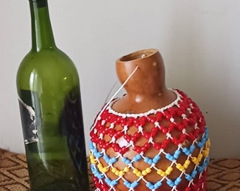Şèkèrè (medium-small Yoruba-style netted gourd rattle)