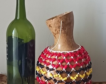Sèkèrè (medium Yoruba-style netted gourd rattle)